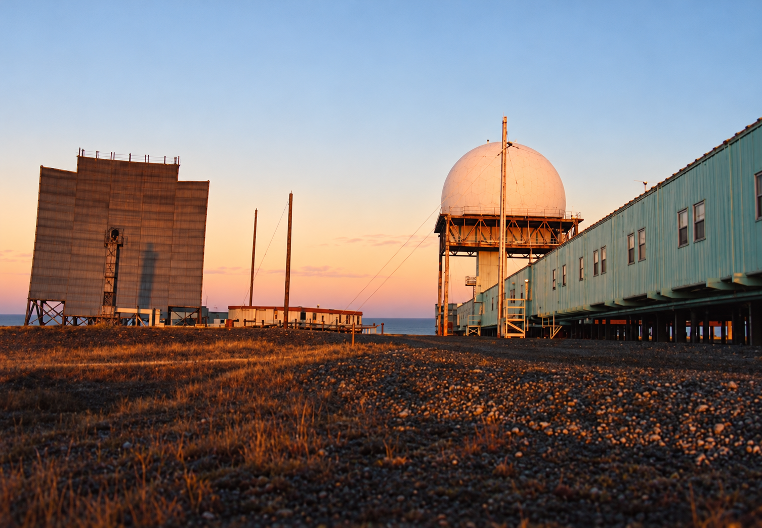 Interpretive late-1980s view of Nicholson Peninsula BAR-4 showing the plain rear of a troposcatter billboard, a raised AN/FPS-19 radome and a long elevated module train on Arctic gravel