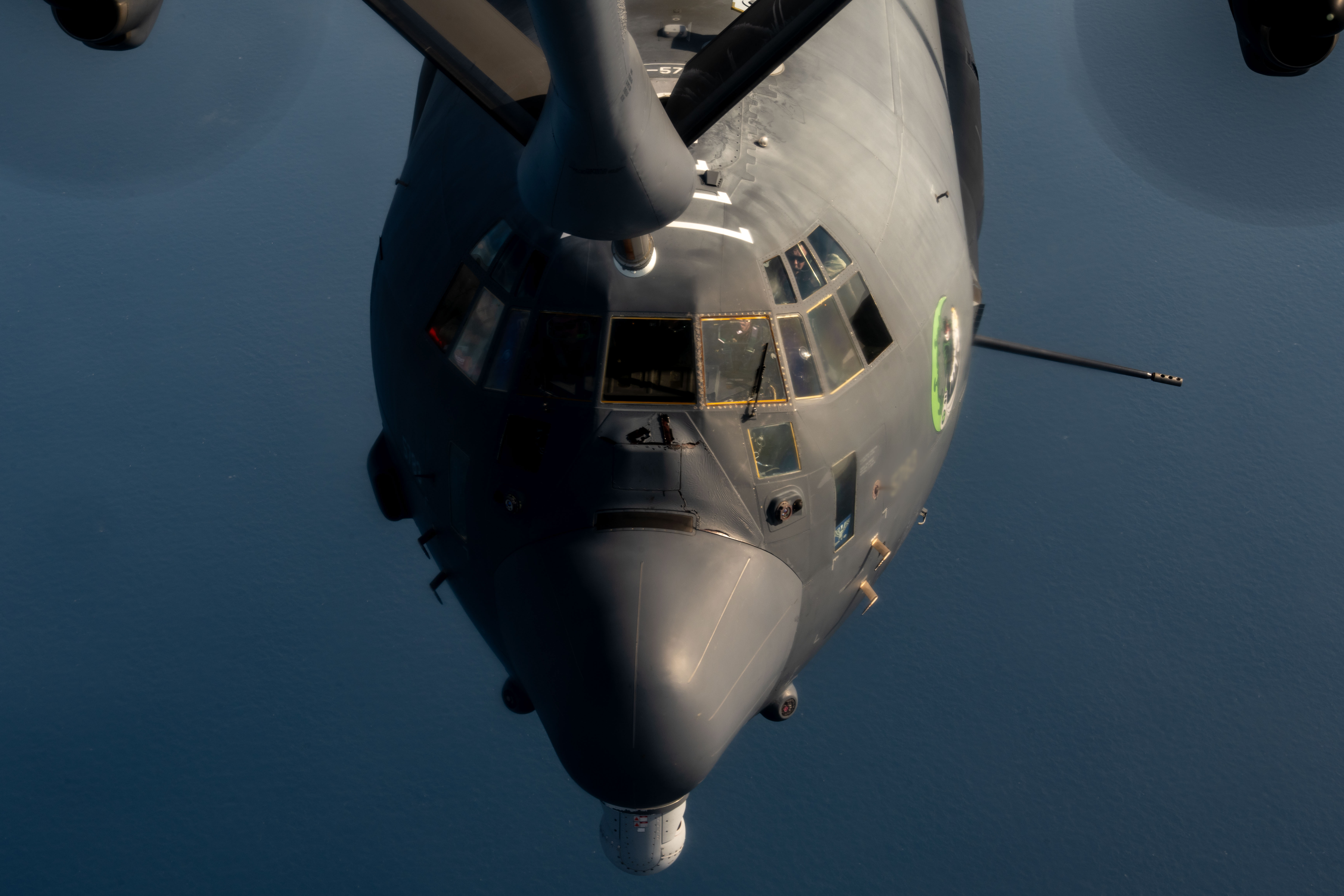 An AC-130J Ghostrider assigned to the 1st Special Operations Wing, Hurlburt Field, Florida, approaches a KC-135 Stratotanker assigned to the 6th Air Refueling Wing over the Gulf of America, May 21, 2025