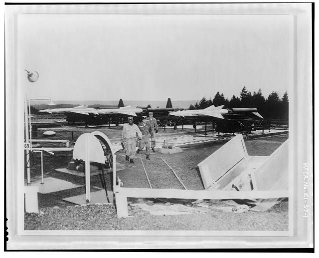 Photocopy of photograph showing unidentified launch area with personnel door, decontamination shower and Ajax missiles from photo archives at U. S. Institute for Military History, Carlisle Barracks, Carlisle, PA, no date