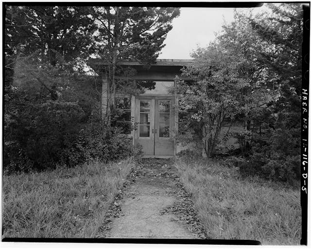 BARRACKS, LONGER BUILDING, FRONT CLOSE-UP OF DOORS, LOOKING WEST