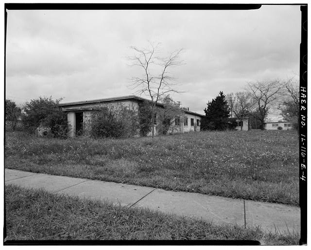 BARRACKS, SHORTER BUILDING, FRONT AND LEFT SIDES, LOOKING NORTHWEST