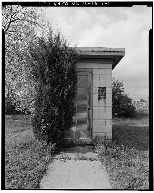 Paint & Oil Storage SHED. SOUTH END OF SHORTER BARRACKS, FRONT, LOOKING WEST