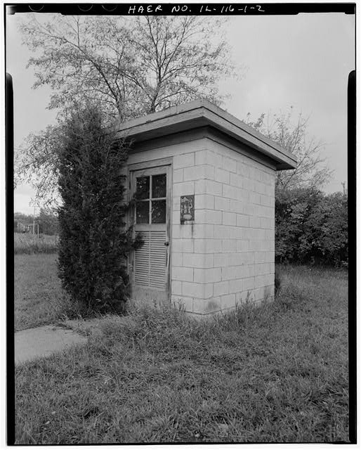 Paint & Oil Storage SHED, SOUTH END OF SHORTER BARRACKS, FRONT AND RIGHT SIDES, LOOKING SOUTHWEST