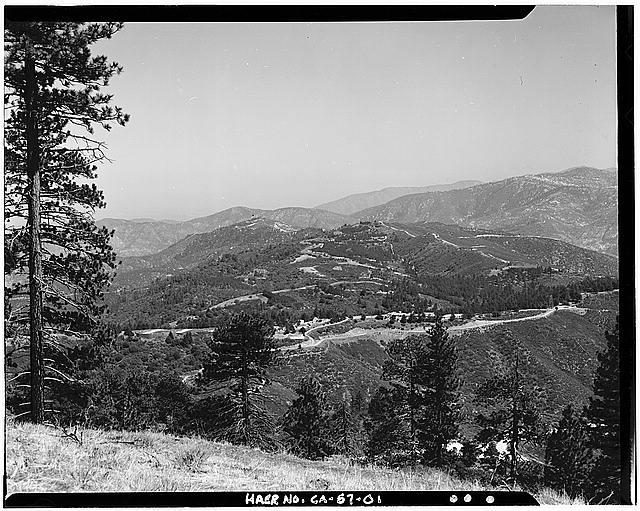 OVERALL VIEW LOOKING NORTH (DOWN HILL), SHOWING LAUNCH PADS AT LEFT, HELIPAD IN FRONT, AND BARRACKS AREA ON RIGHT