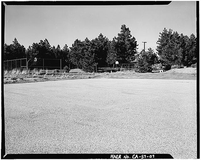 OVERALL VIEW OF LAUNCH PAD, SHOWING HELIPAD AT LAUNCH AREA, LOOKING NORTH. BASKETBALL COURT IN BACKGROUND