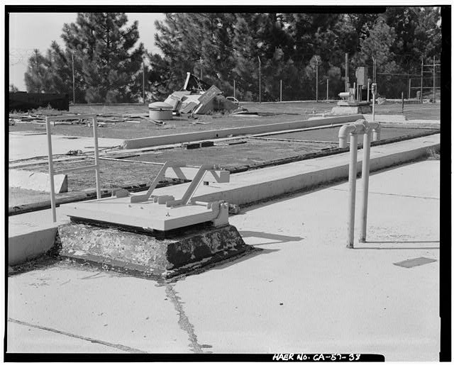 VIEW SHOWING 'CATFISH' SILO ELEVATOR IN UP POSITION, LOOKING NORTHWEST