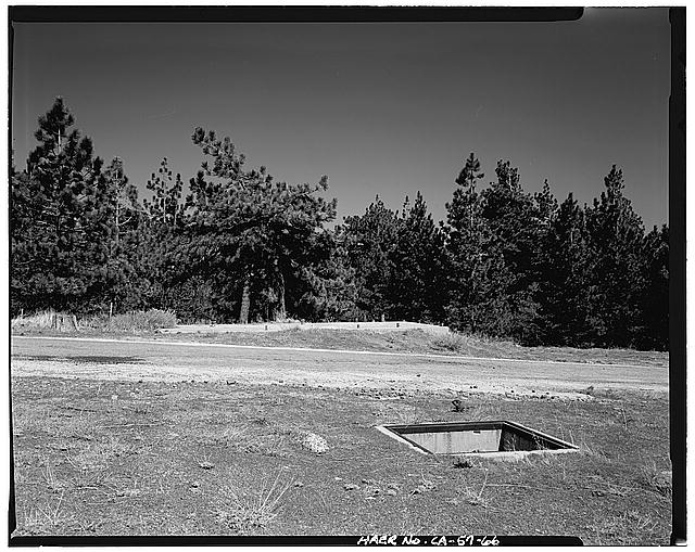 VIEW INTO ELECTRICAL CONDUIT AT RADAR SITE IN PAD, LOOKING SOUTHEAST