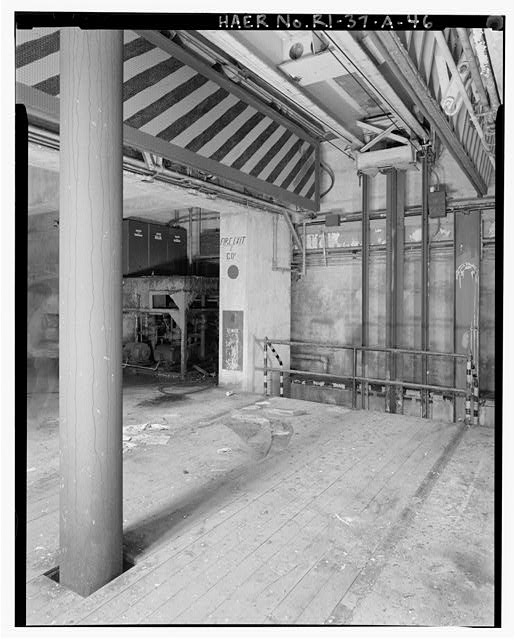 Quincy, MA, BO-37, Launch Area, Underground Missile Storage Structure, interior view of elevator system with overhead doors in open position and hydraulic shaft in left foreground VIEW WEST