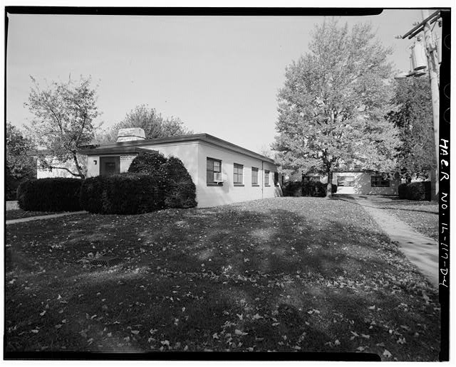 BARRACKS, NEXT TO BASKETBALL COURT, FRONT AND LEFT SIDE, LOOKING NORTHWEST