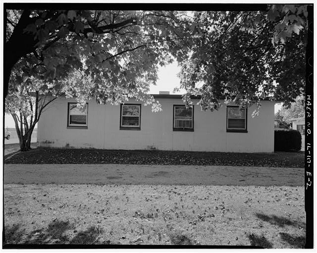 BARRACKS, WITH PARKING LOT IN FRONT, RIGHT SIDE, LOOKING SOUTHEAST