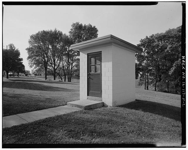 PAINT AND OIL STORAGE SHED, FRONT AND RIGHT SIDES, LOOKING SOUTH