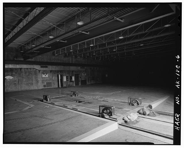 Nike Missile Site Summit, Alaska INTERIOR OF MISSILE LAUNCH AND STORAGE BUILDING WITH MISSILE TRANSPORT CARRIAGE.