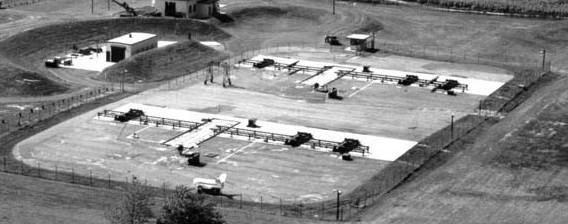 This closeup of the launcher area shows elevators on which missiles were raised from underground storage magazines for firing. 