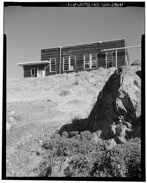 Mill Valley Radar Station EXTERIOR OF THE MOTOR REPAIR SHOP FROM BELOW, BUILDING 104, LOOKING NORTH.