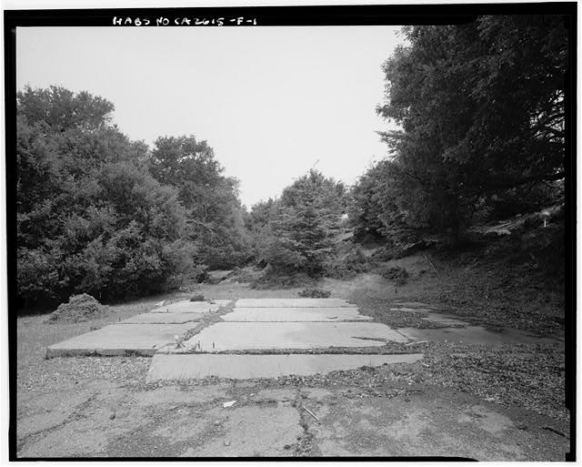 Mill Valley Early Warning Radar  VIEW OF THE FOUNDATION OF BUILDING 107, MOTORCYCLE HOBBY SHOP, LOOKING EAST-NORTHEAST.