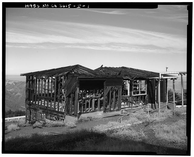 Mill Valley Early Warning Radar EXTERIOR VIEW OF THE PARTIALLY DESTROYED THEATER, BUILDING 203, LOOKING WEST-NORTHWEST.