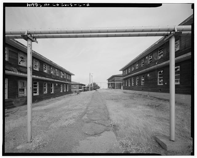 Mill Valley Early Warning Radar Station  AXIAL VIEW LOOKING BETWEEN THE BACHELOR AIRMEN QUARTERS, BUILDINGS 212 AND 214, LOOKING NORTH NORTHEAST.