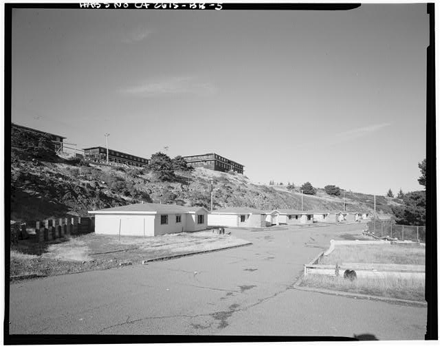 Mill Valley Early Warning Radar Station CLOSE UP VIEW LOOKING DOWN THE ROAD AT THE FAMILY HOUSING, BUILDINGS 600-608, LOOKING NORTH.