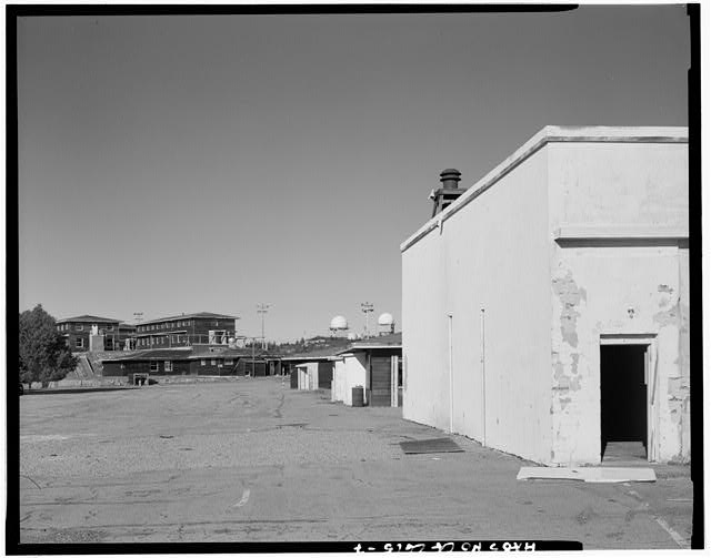 Mill Valley Early Warning Radar Station CONTEXT VIEW OF THE WEST END OF THE SITE, BUILDING 102 IN THE RIGHT FOREGROUND, LOOKING NORTHEAST.