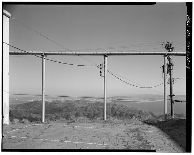 Mill Valley Early Warning Radar Station OVERALL CONTEXT OF SAN FRANCISCO THROUGH PIPES BETWEEN BUILDING 102 AND 104, LOOKING SOUTH-SOUTHEAST.