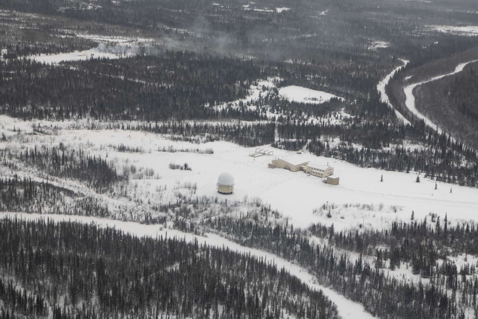 Wide 2023 aerial of Fort Yukon Long Range Radar Site in the Yukon Flats