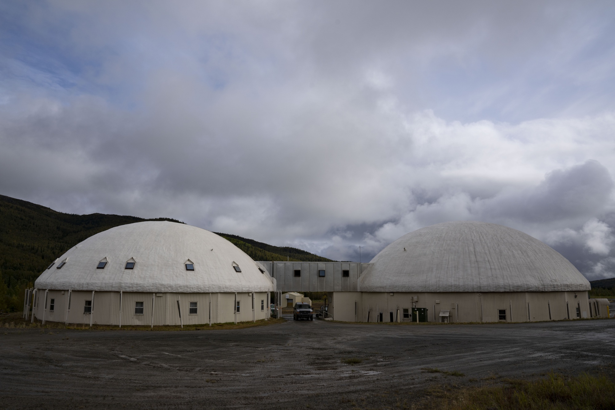Two connected domed support structures at Indian Mountain lower camp in 2023