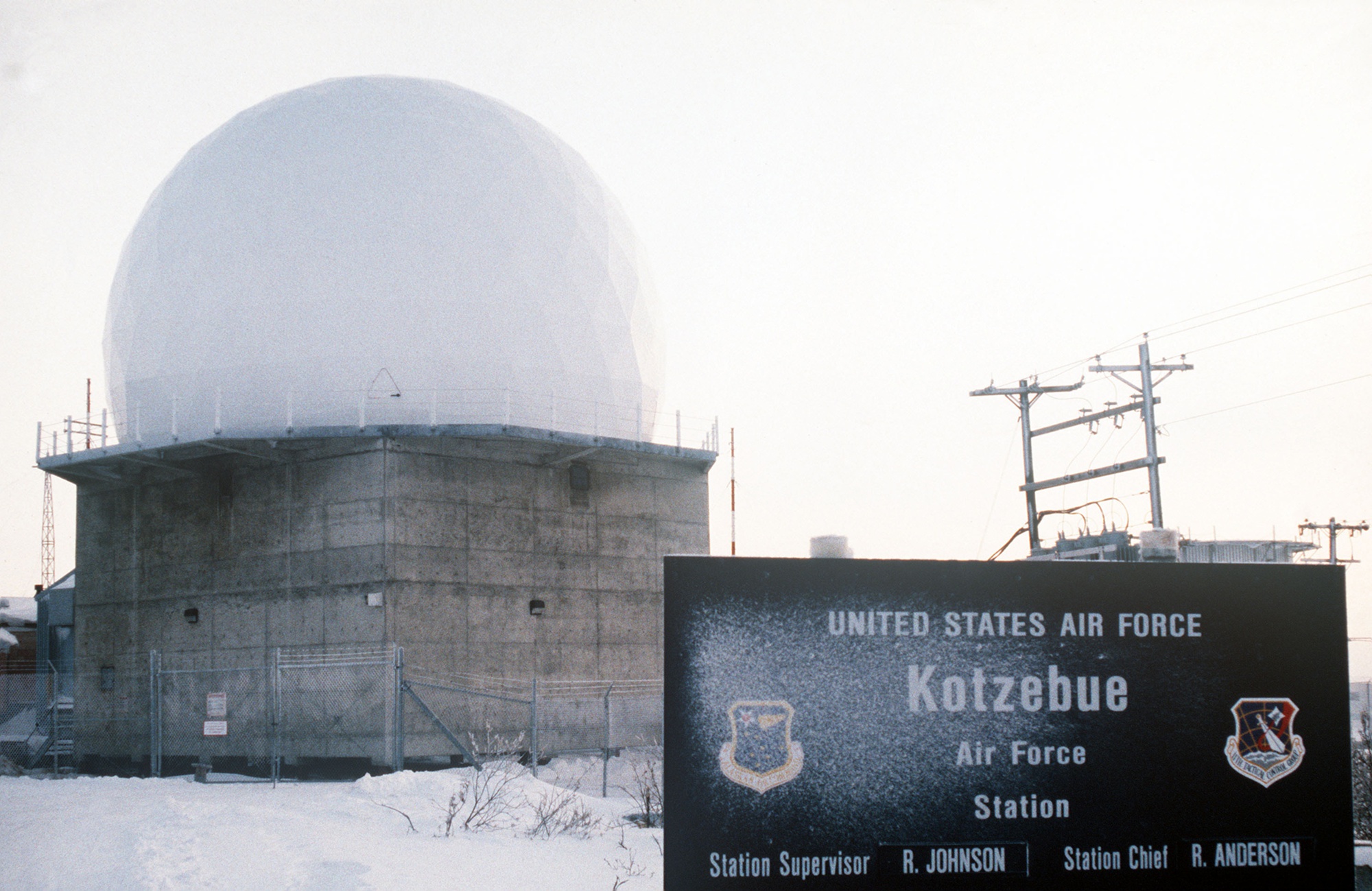 1989 U.S. Air Force photograph showing the Kotzebue radar radome and station entrance sign