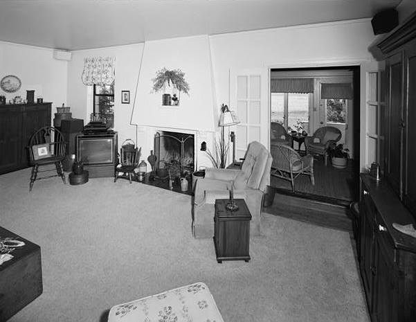  LIVING ROOM, LOOKING SOUTH TOWARD FIREPLACE AND PORCH ENTRANCE