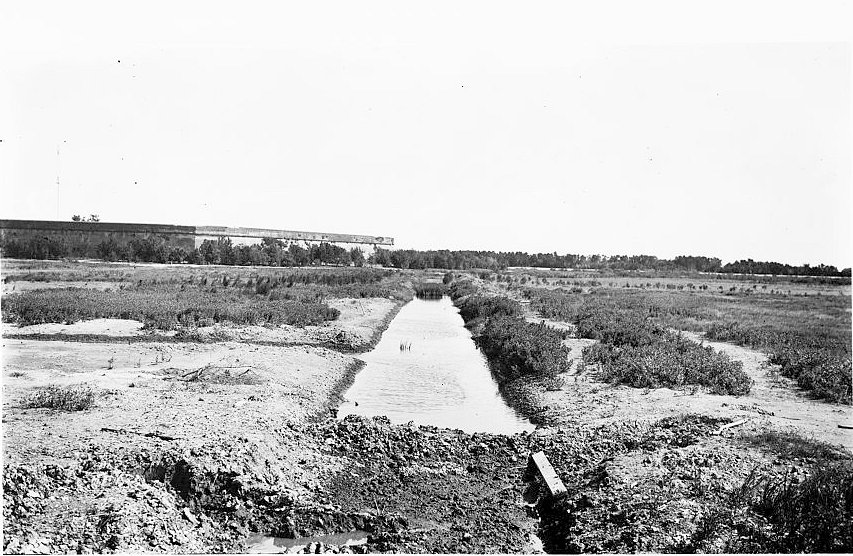 Historic View Looking up Drainage to the Feeder Canal and Fort beyond During Restoration.