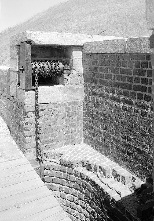 Detail View of Entrance Gate Showing Chain Used to Raise the Drawbridge.