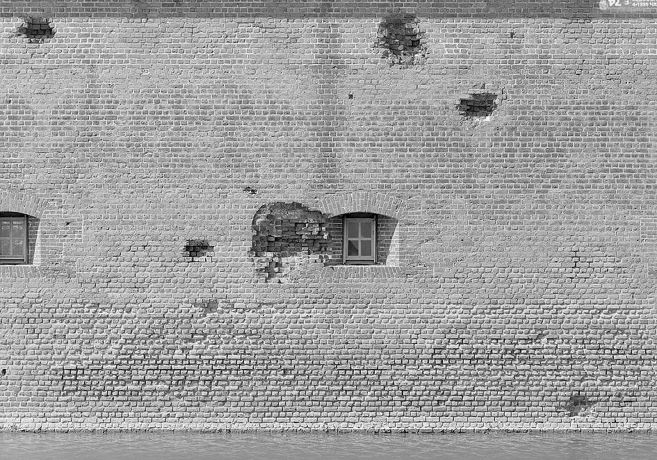 Detail View of Damaged Embrasure in South Wall near the Southeast End.