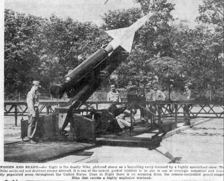 Newspaper photo of Nike Ajax in firing position at site D-06, Utica MI