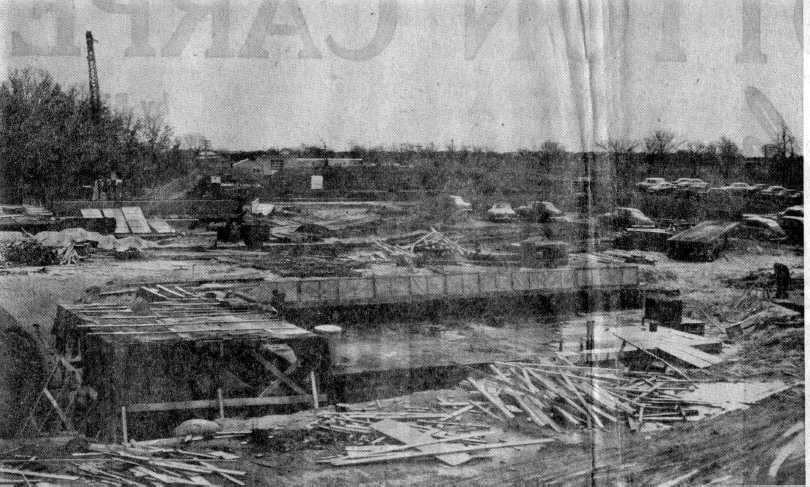 Newspaper photo showing construction at site D-06, Utica MI