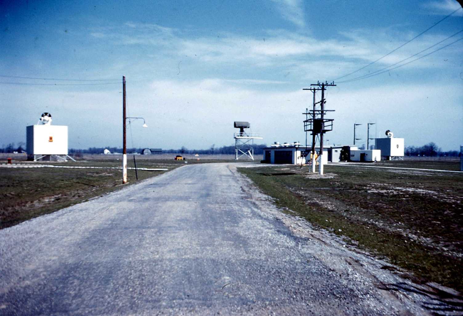 Looking North toward the radar towers in 1961. TTR tower is to the left, LOPAR antenna is in the center, MTR to the right. 