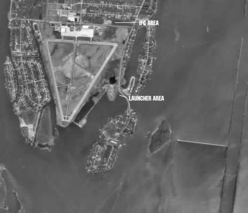 This is a larger picture of the area which shows the whole airfield. The Launcher area is indicated in the lower right and the IFC area is in the upper right area. The only items remaining in the IFC are the 2 radar towers which are right on the fence line