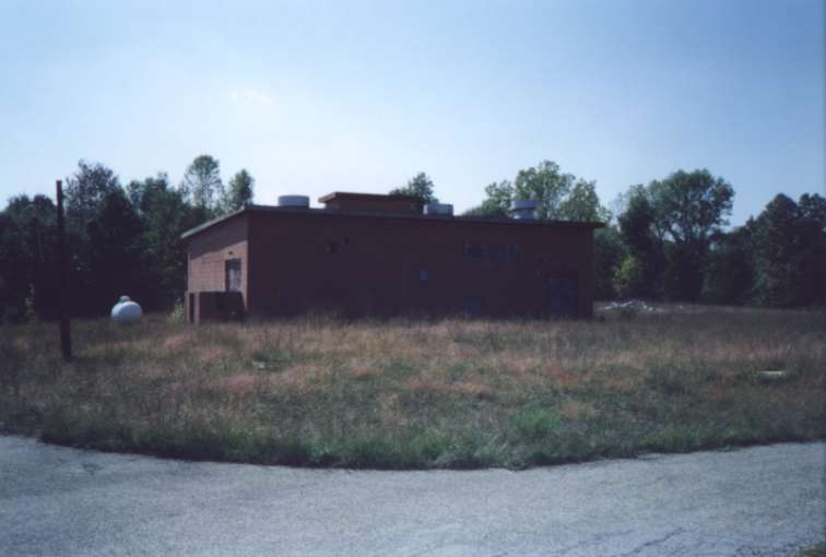 The HIPAR building.  You can see a bit of the HIPAR tower foundation peeking above the grass in spots