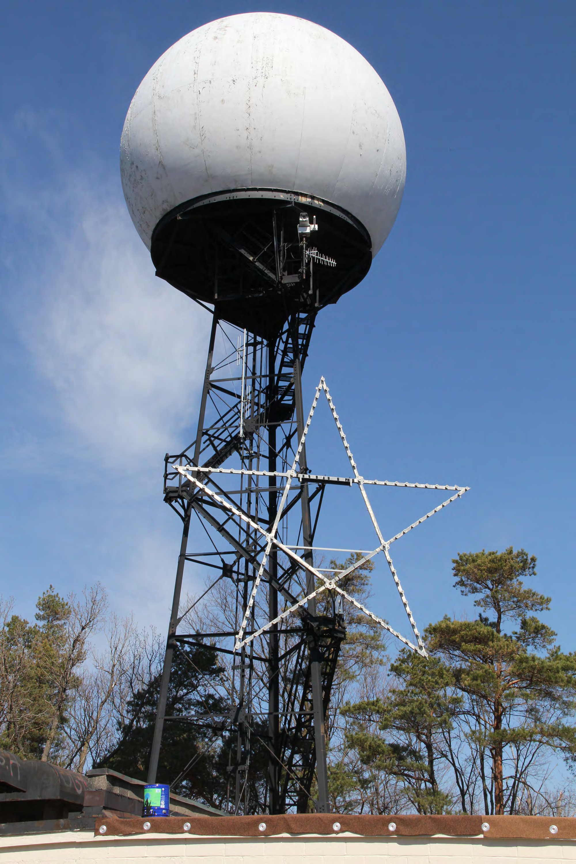 Closer view of antenna tower, from southeast.