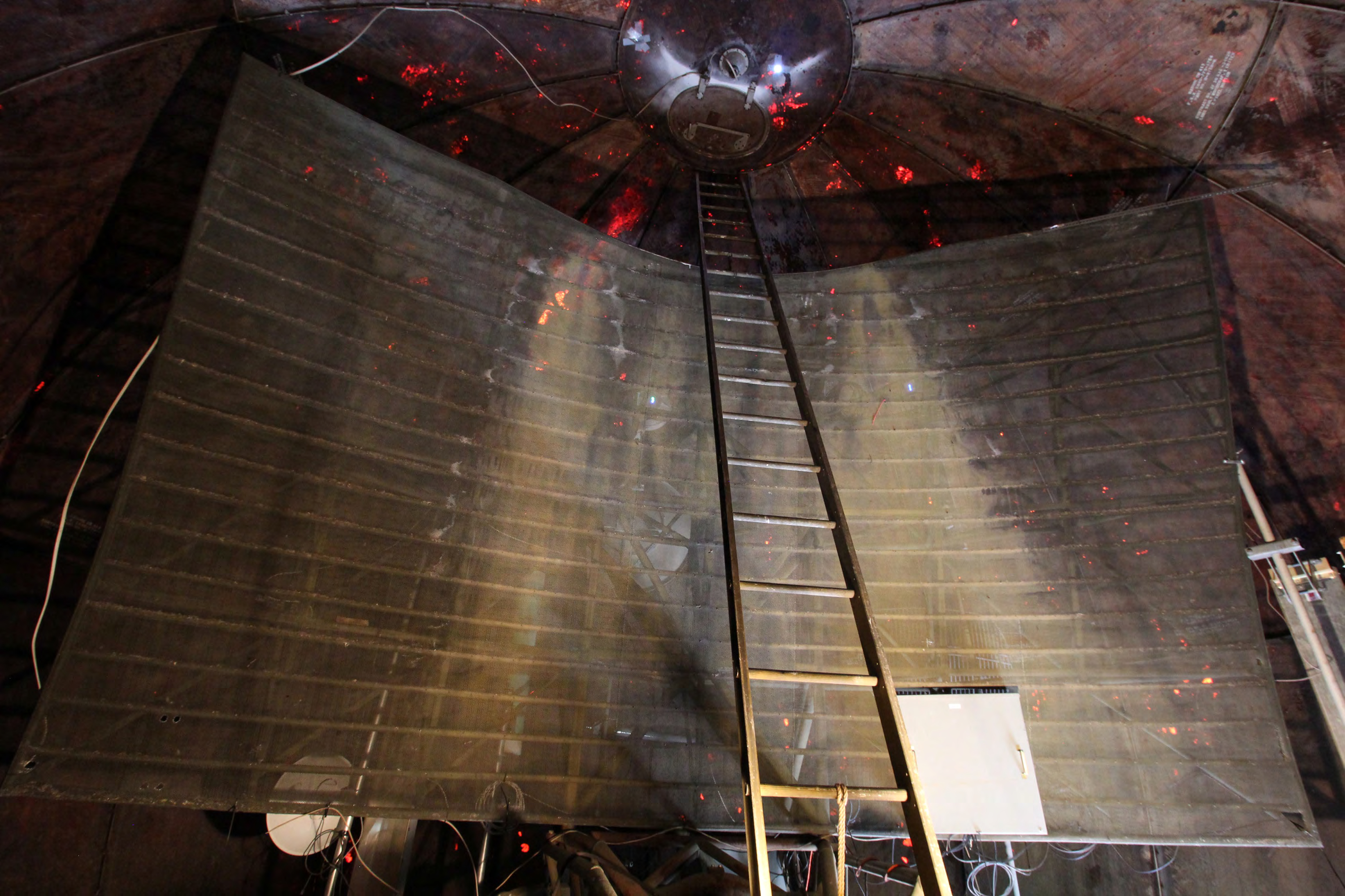 Radar antenna reflector from west inside radome